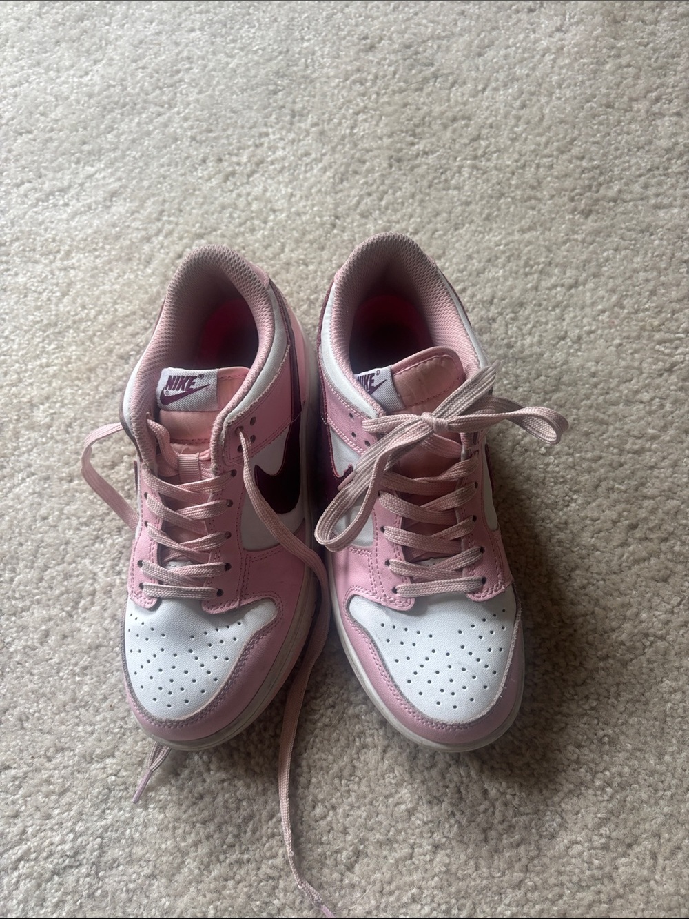 Nike Women’s Low-Top Sneakers in Pink and White with Maroon Swoosh